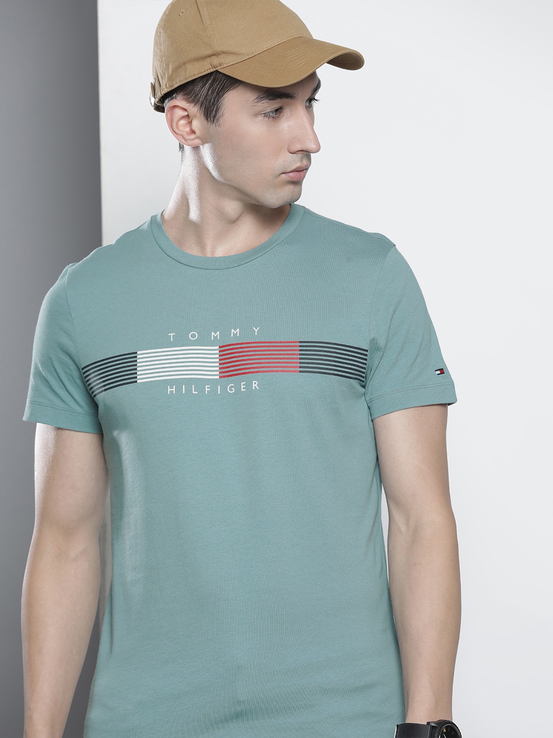 

Tommy Hilfiger Men Teal Blue Striped Slim Fit T-shirt