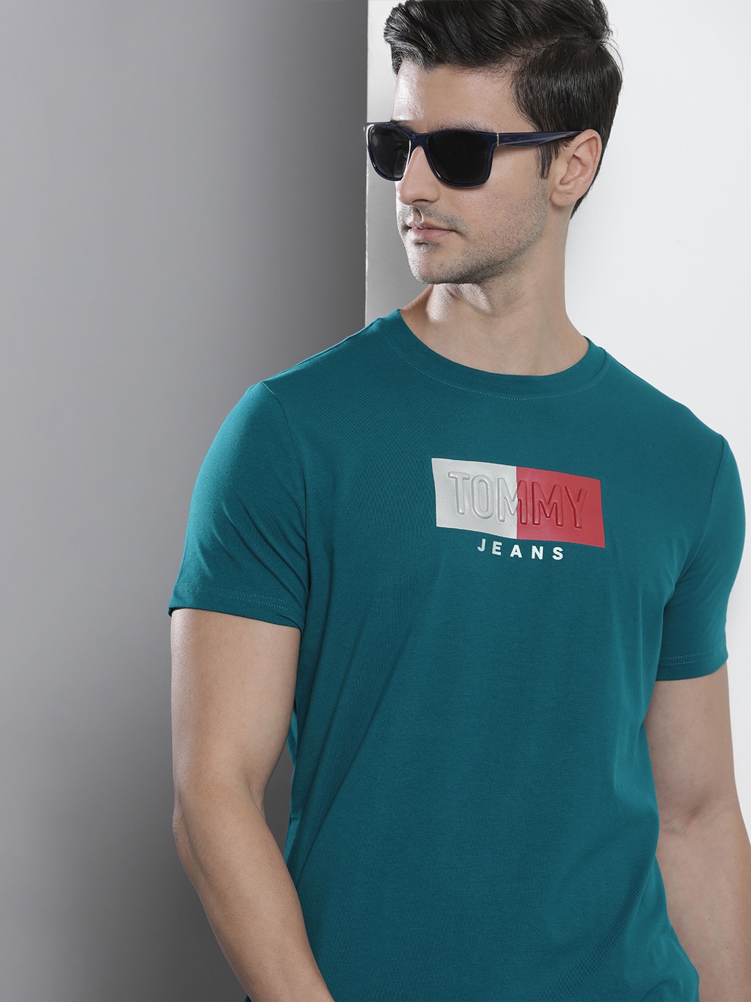 

Tommy Hilfiger Men Teal Blue Typography Applique Slim Fit Casual T-shirt