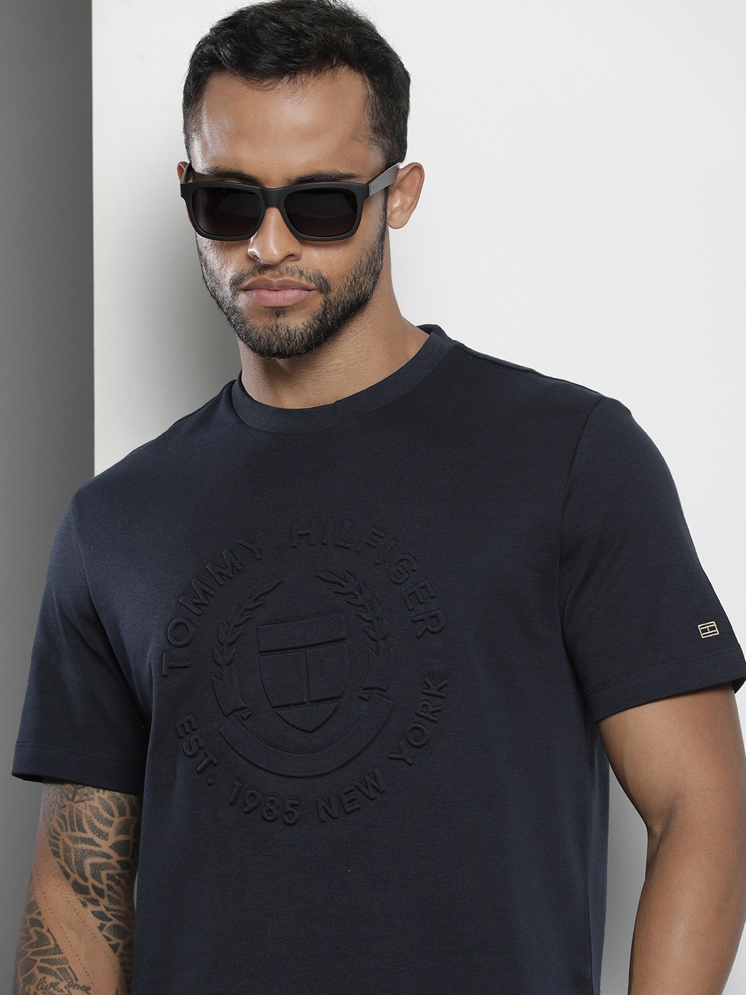 

Tommy Hilfiger Men Navy Blue Solid Brand Logo Embossed Pure Cotton T-shirt