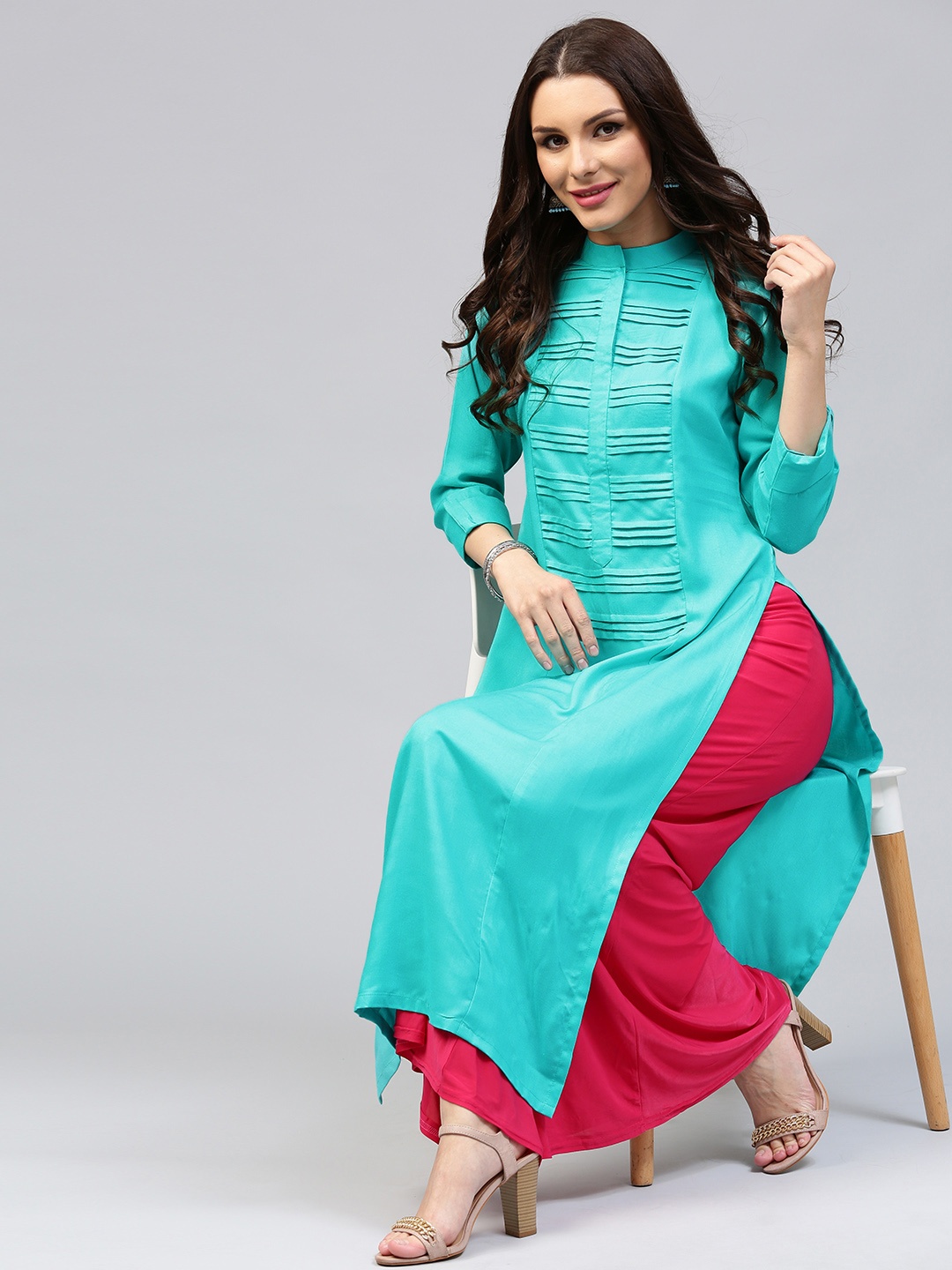 

Libas Women Blue Solid Straight Kurta