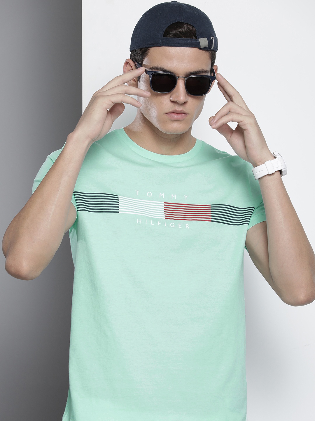 

Tommy Hilfiger Men Sea Green & Red Striped Pure Cotton Slim Fit T-shirt