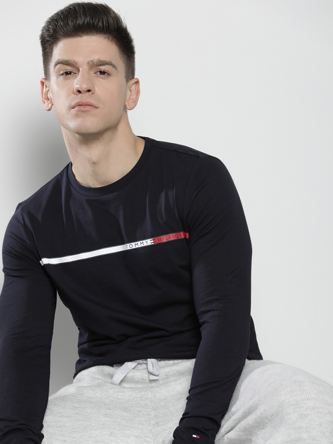 

Tommy Hilfiger Men Navy Blue & White Striped Pure Cotton Slim Fit T-shirt