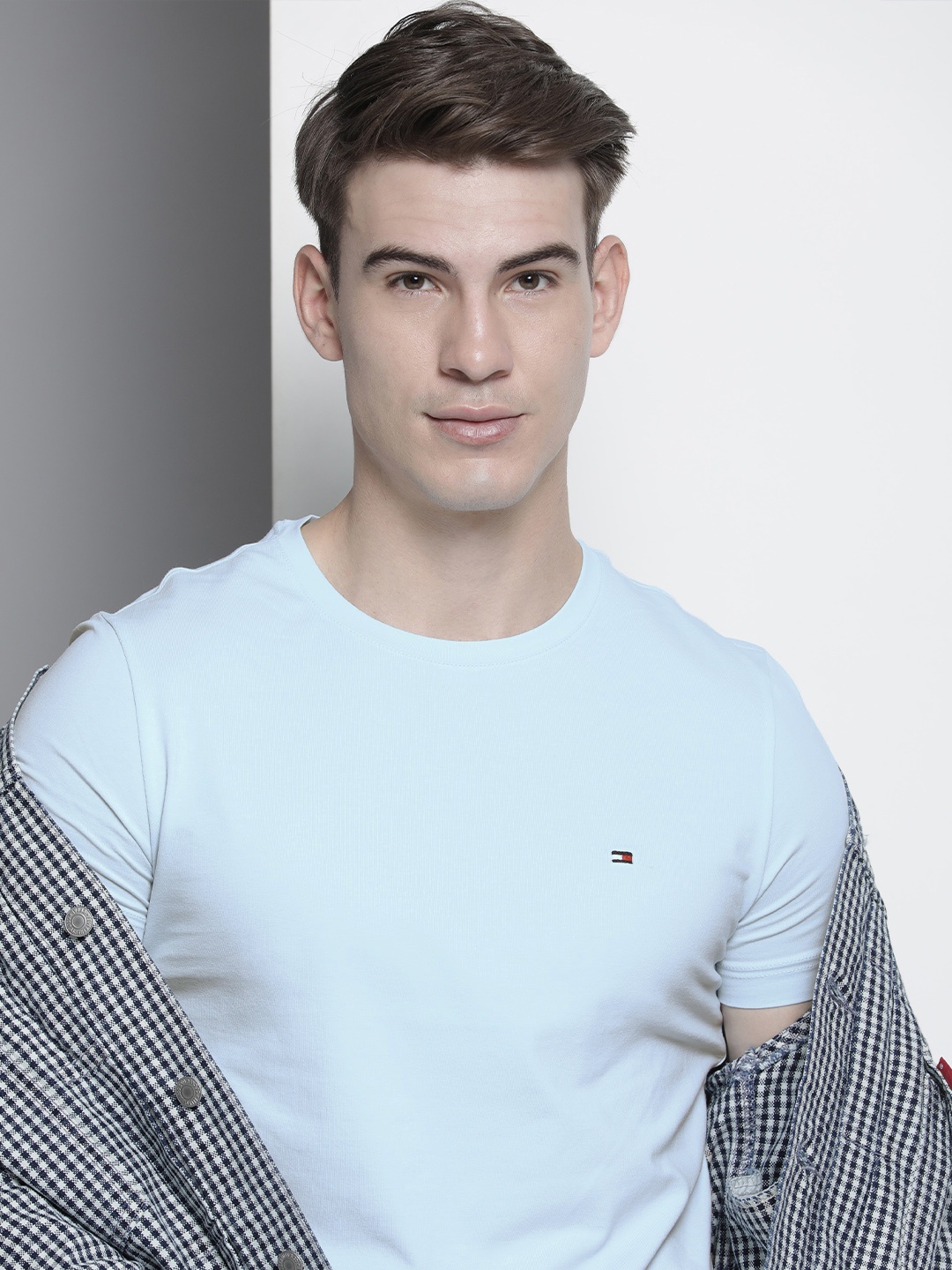 

Tommy Hilfiger Men Blue Solid Slim Fit T-shirt
