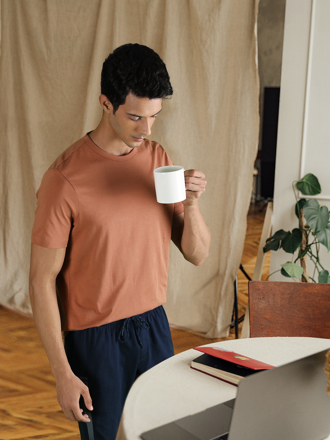 

Tommy Hilfiger Men Rust Brown Solid Pure Cotton Casual T-shirt