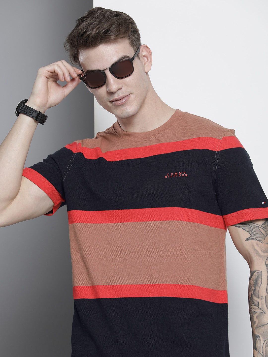 

Tommy Hilfiger Men Rust Pink & Navy Blue Colourblocked Pure Cotton T-shirt