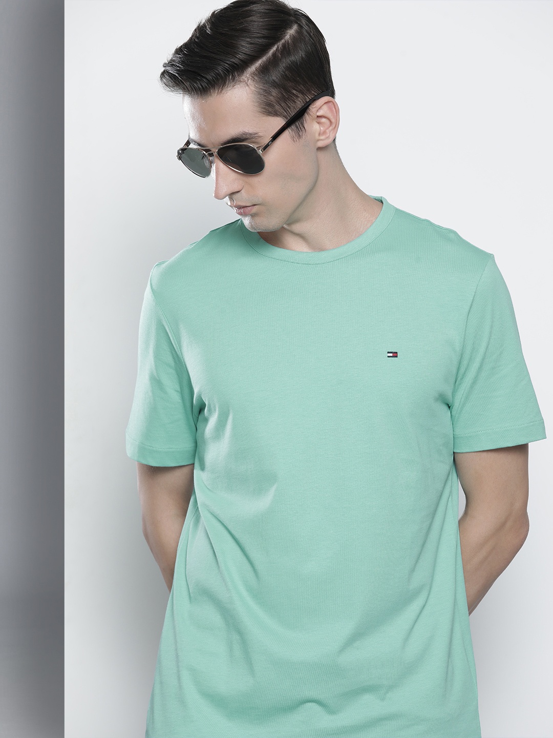 

Tommy Hilfiger Men Green Brand Logo Printed Pure Cotton T-shirt