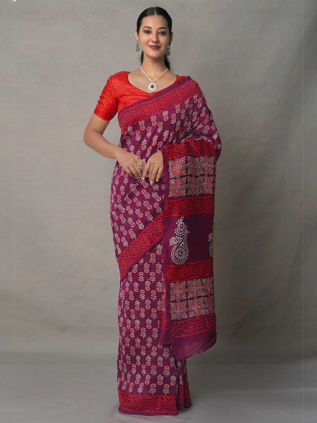 

Unnati Silks Maroon & White Ethnic Motifs Silk Cotton Chanderi Saree