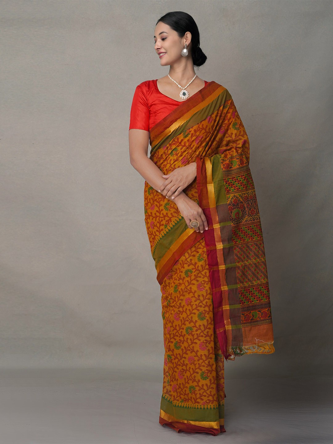 

Unnati Silks Orange & Green Ethnic Motifs Pure Cotton Block Print Saree