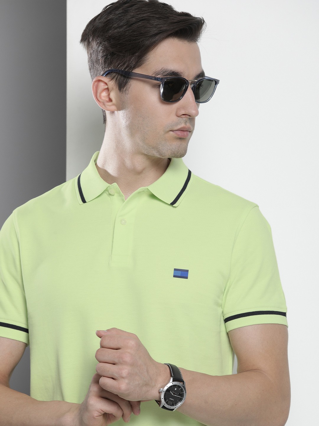 

Tommy Hilfiger Men Green Solid Polo Collar Slim Fit Pure Cotton T-shirt