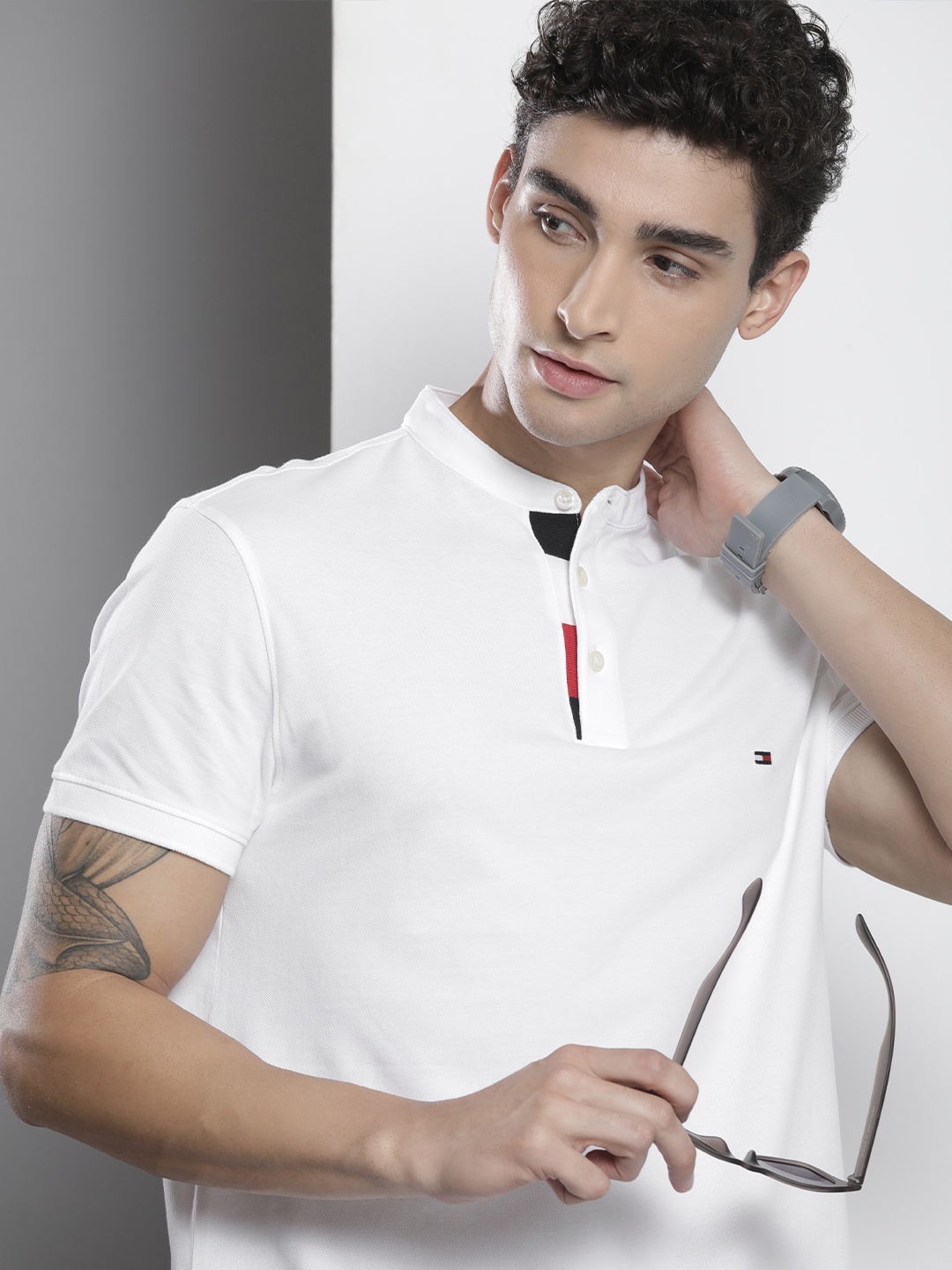 

Tommy Hilfiger Men White Solid Mandarin Collar Slim Fit Pure Cotton Casual T-shirt