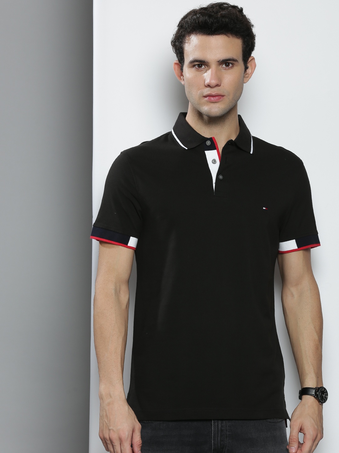 

Tommy Hilfiger Men Black Solid Polo Collar Slim Fit Pure Cotton T-shirt