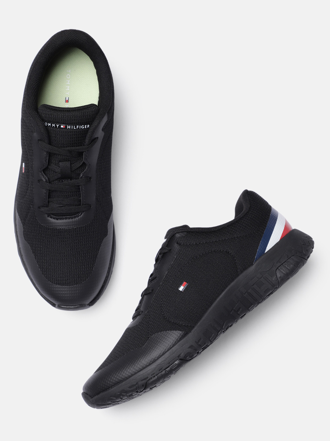 

Tommy Hilfiger Men Black Solid Lightweight Sneakers