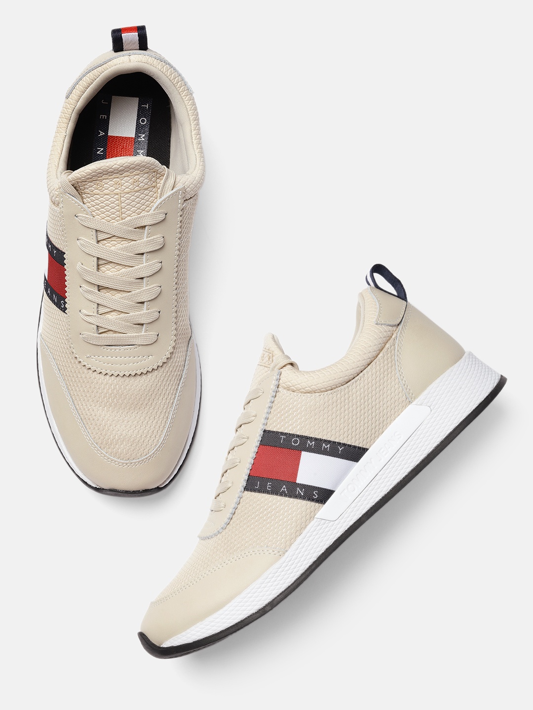 

Tommy Hilfiger Men Beige Solid Sneakers