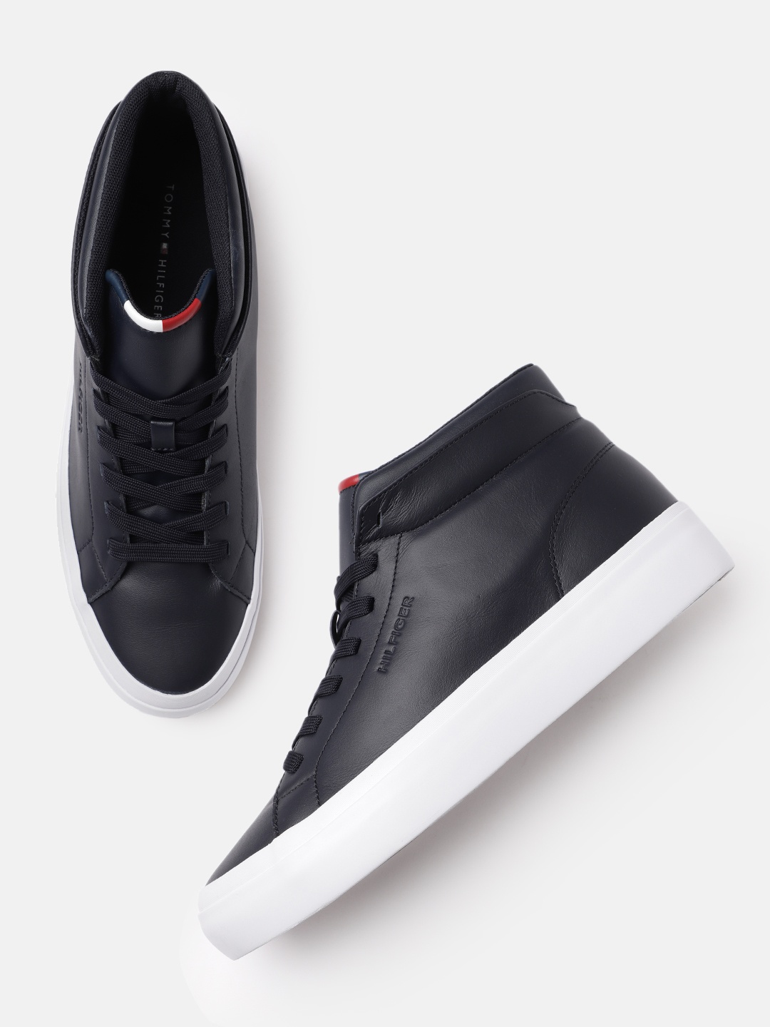 

Tommy Hilfiger Men Navy Blue Solid Leather Mid-Top Sneakers