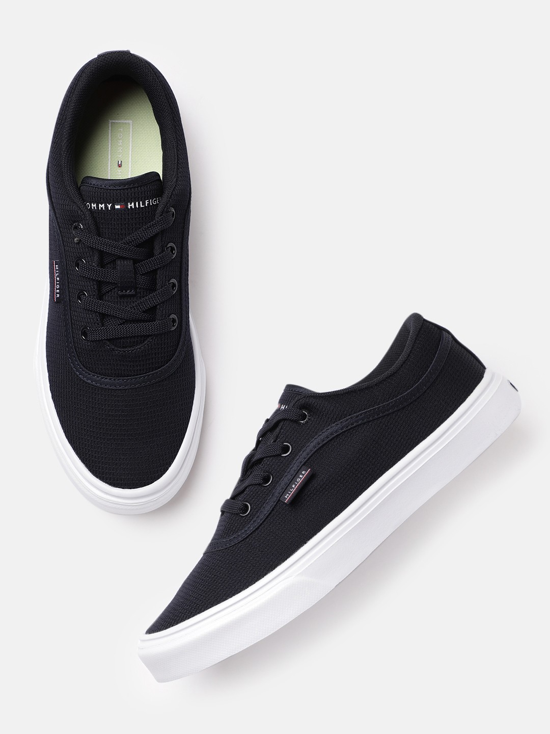 

Tommy Hilfiger Men Navy Blue Solid Sneakers