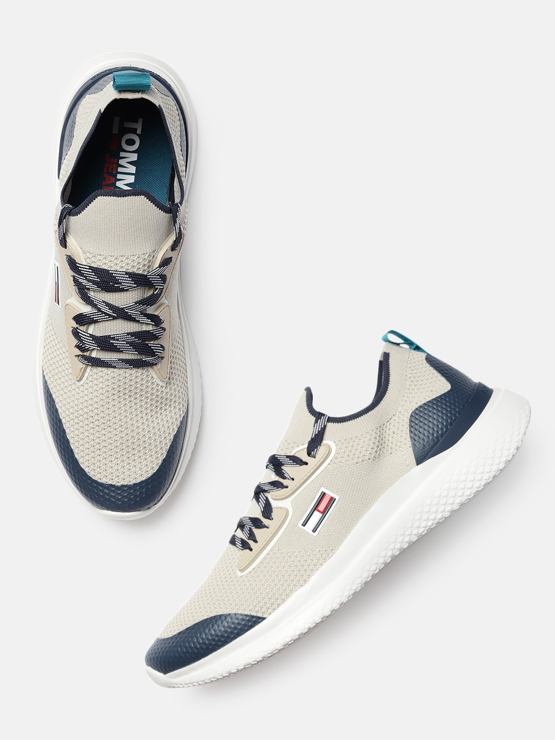 

Tommy Hilfiger Men Beige Solid Sneakers
