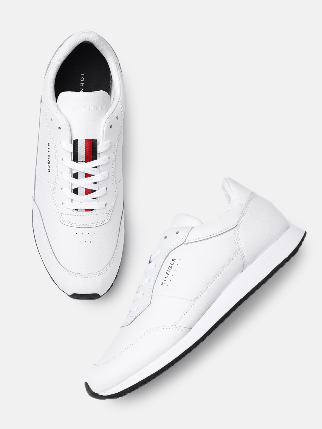 

Tommy Hilfiger Men White Solid Leather Sneakers