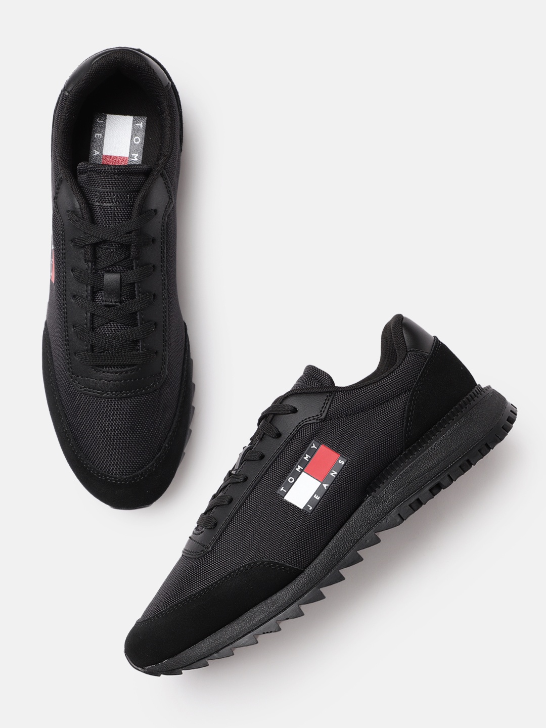 

Tommy Hilfiger Men Black Solid Sneakers