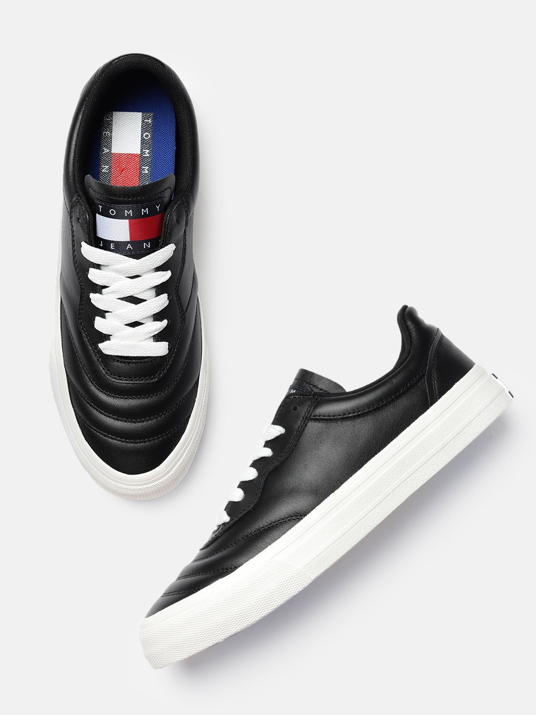 

Tommy Hilfiger Men Black Solid Leather Sneakers