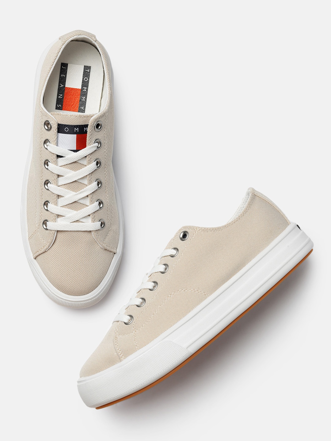 

Tommy Hilfiger Men Beige Solid Sneakers