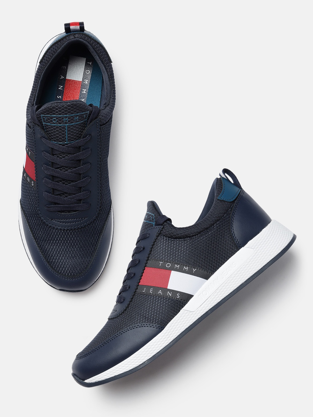 

Tommy Hilfiger Men Navy Blue Solid Sneakers
