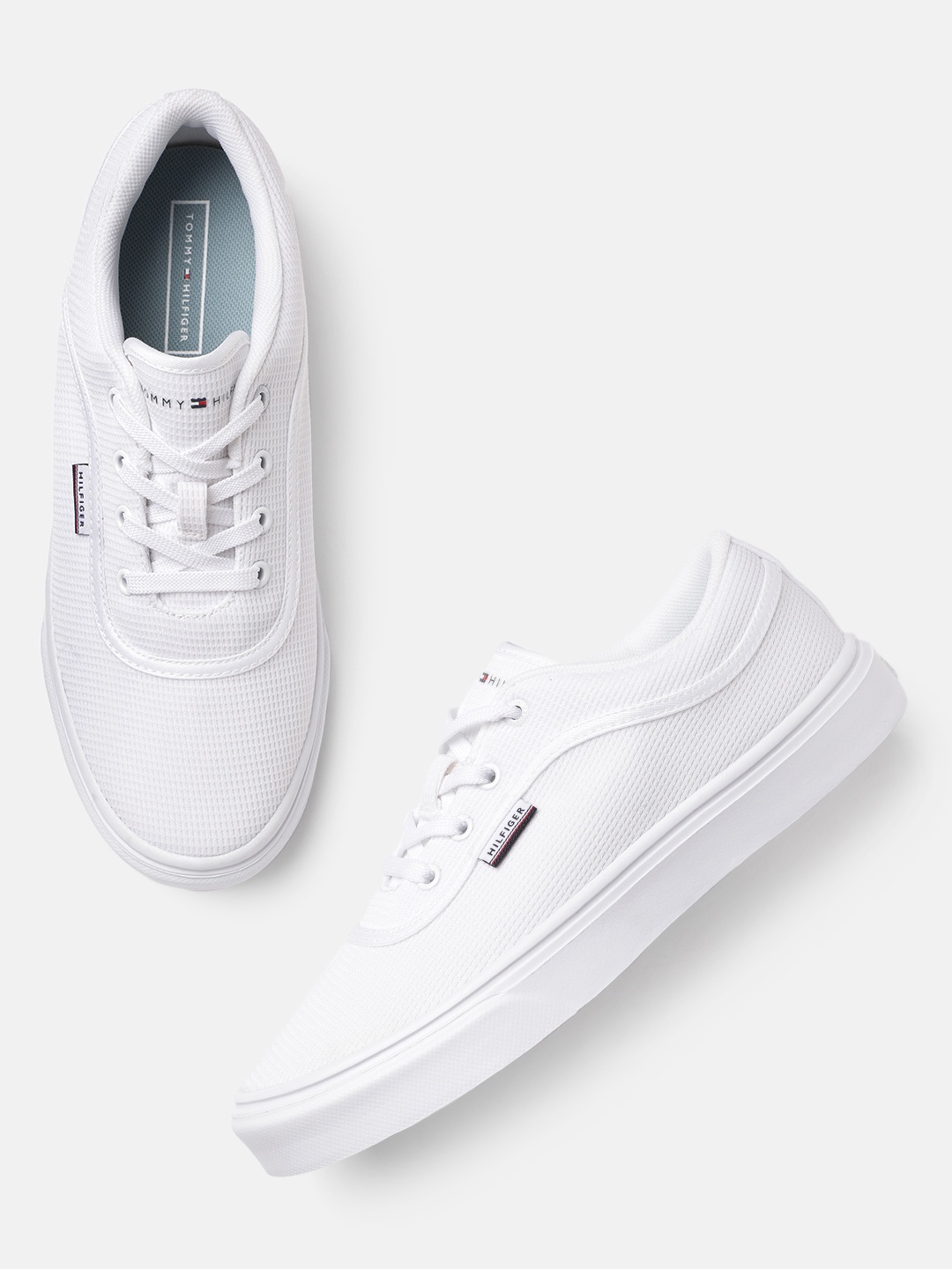

Tommy Hilfiger Men White Solid Sneakers