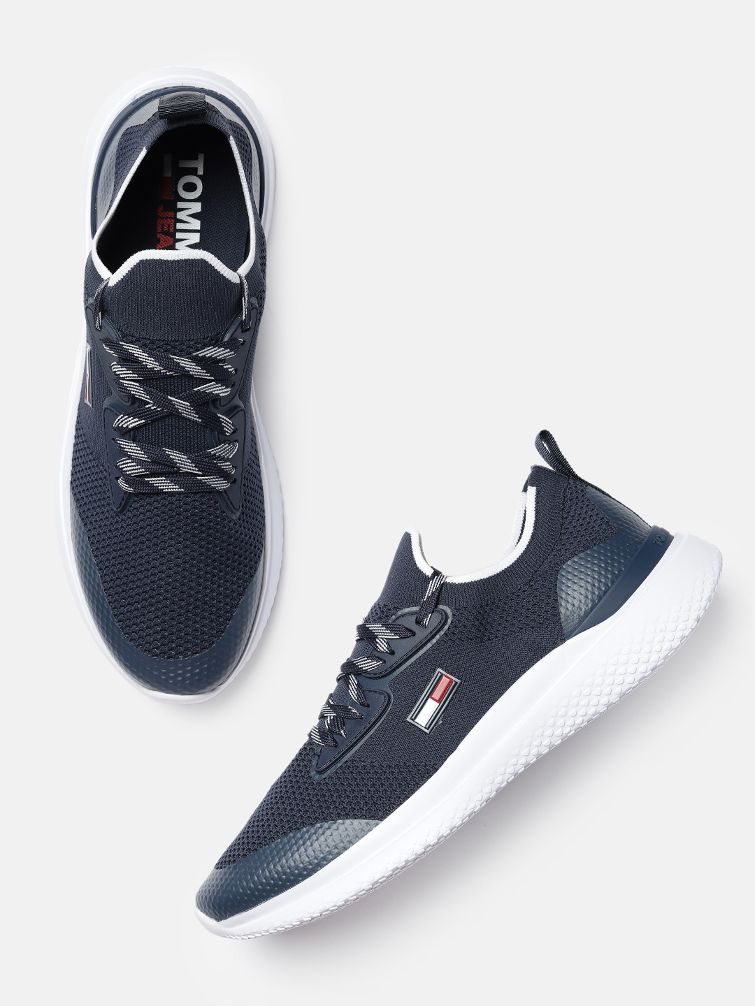 

Tommy Hilfiger Men Blue Solid Sneakers