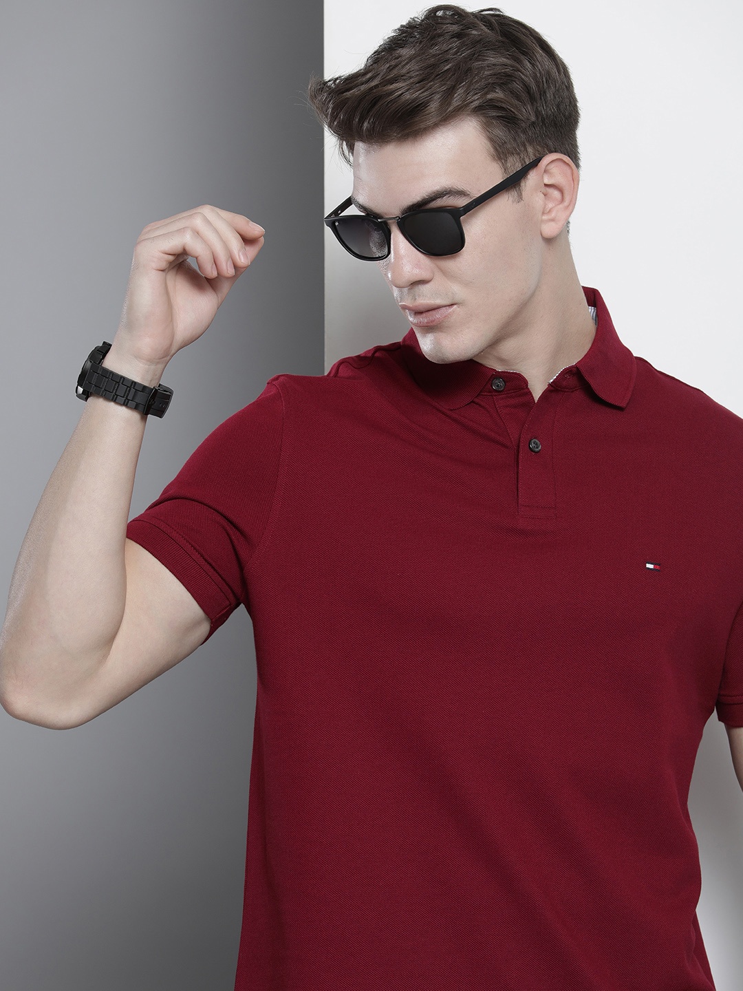 

Tommy Hilfiger Men Maroon Solid Polo Collar Casual T-shirt