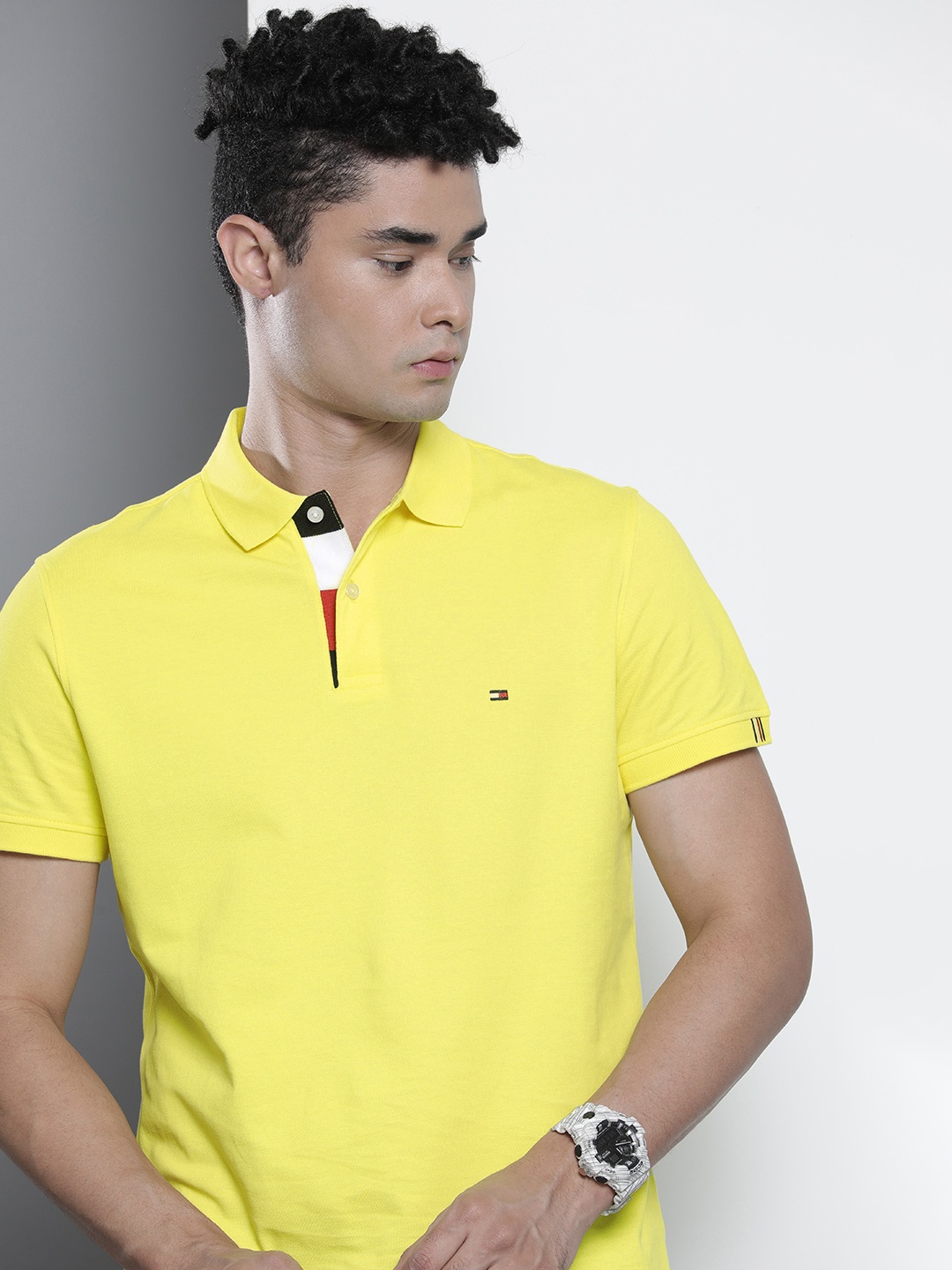 

Tommy Hilfiger Men Yellow Pure Cotton Polo Collar T-shirt