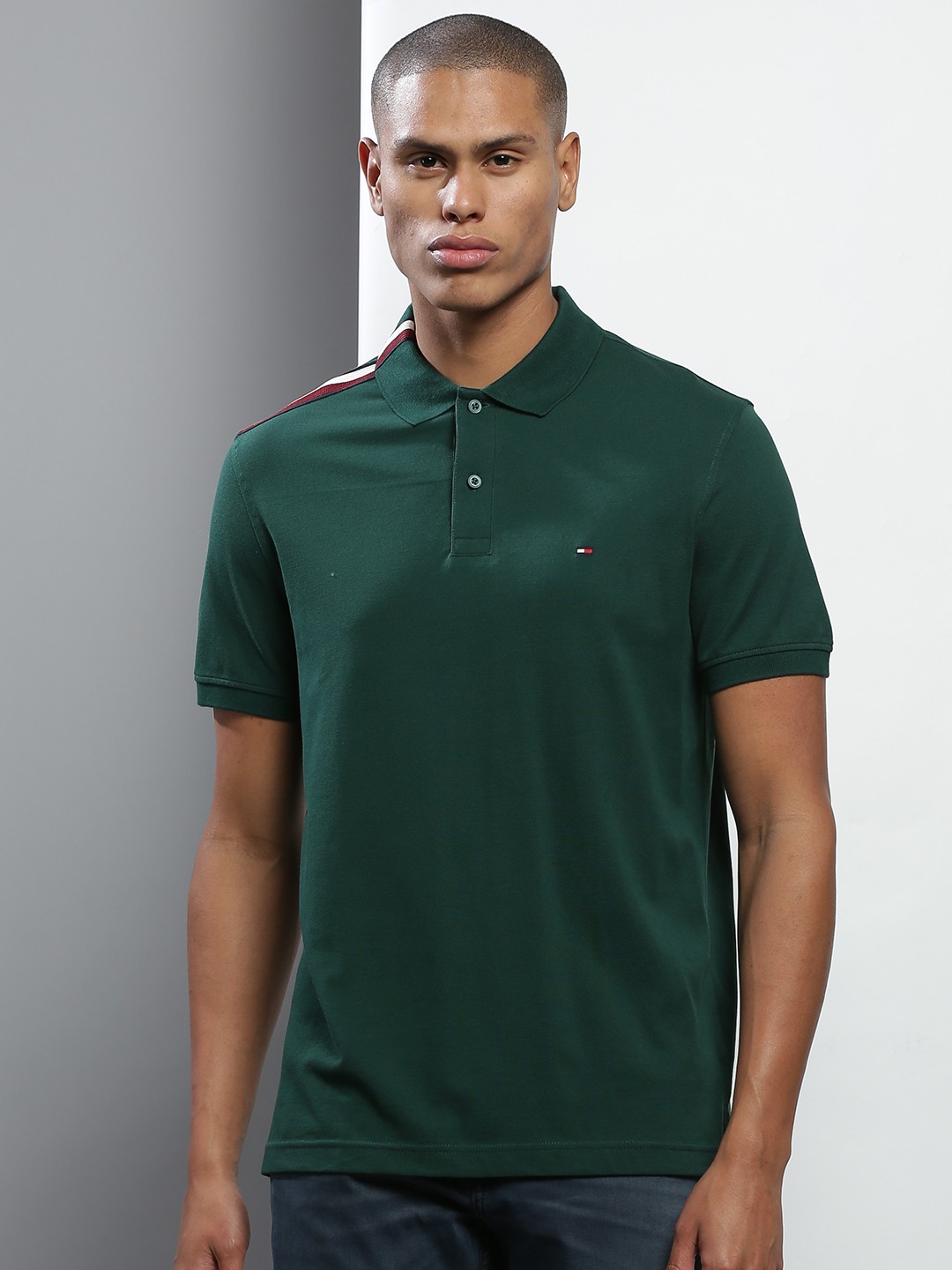 

Tommy Hilfiger Men Green Solid Cotton Polo Collar T-shirt