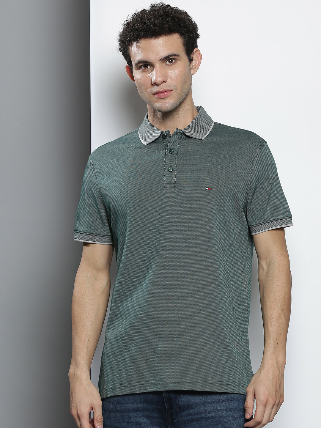 

Tommy Hilfiger Men Green Solid Polo Collar Pure Cotton T-shirt