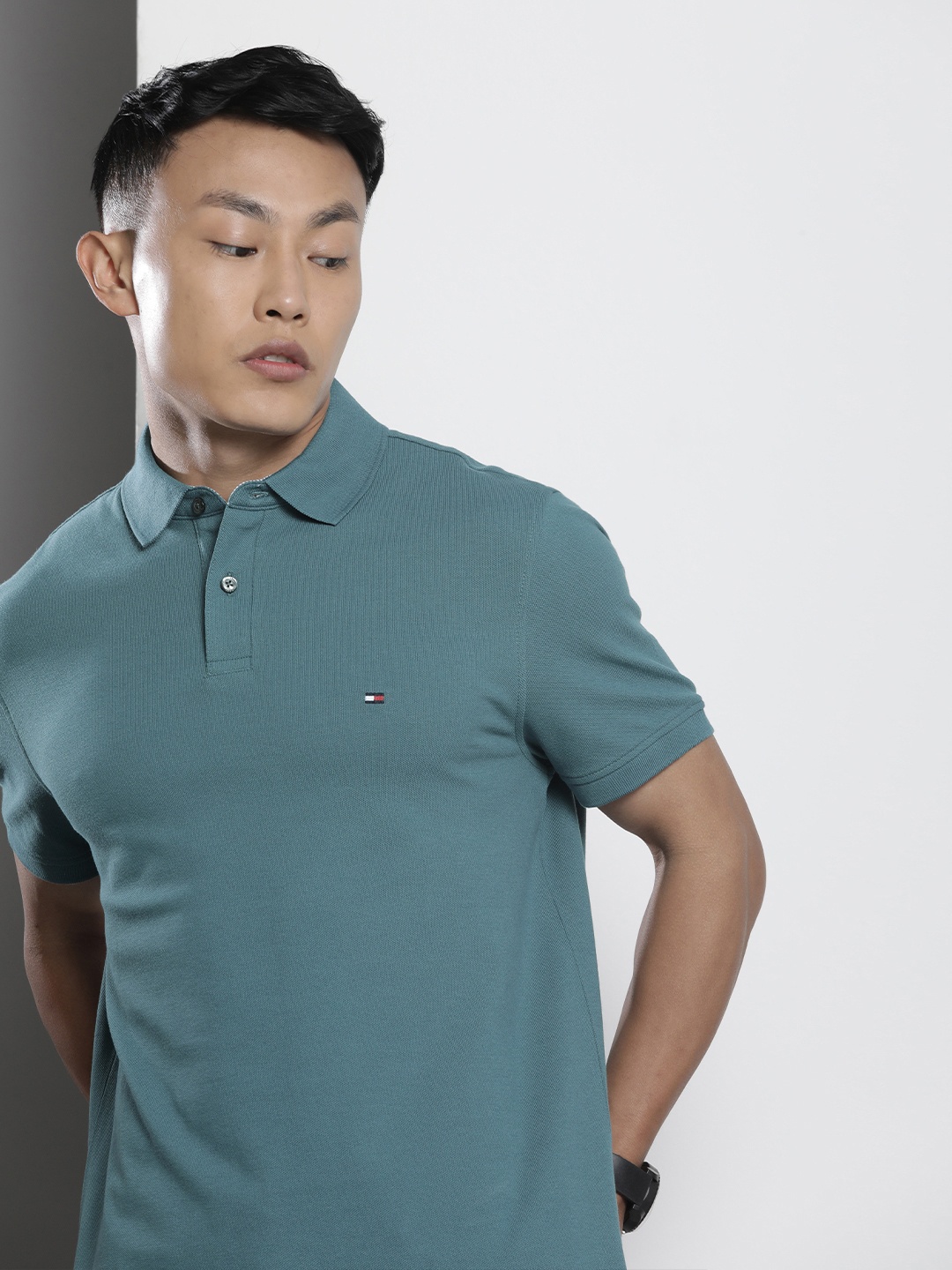 

Tommy Hilfiger Men Teal Blue Polo Collar Casual T-shirt