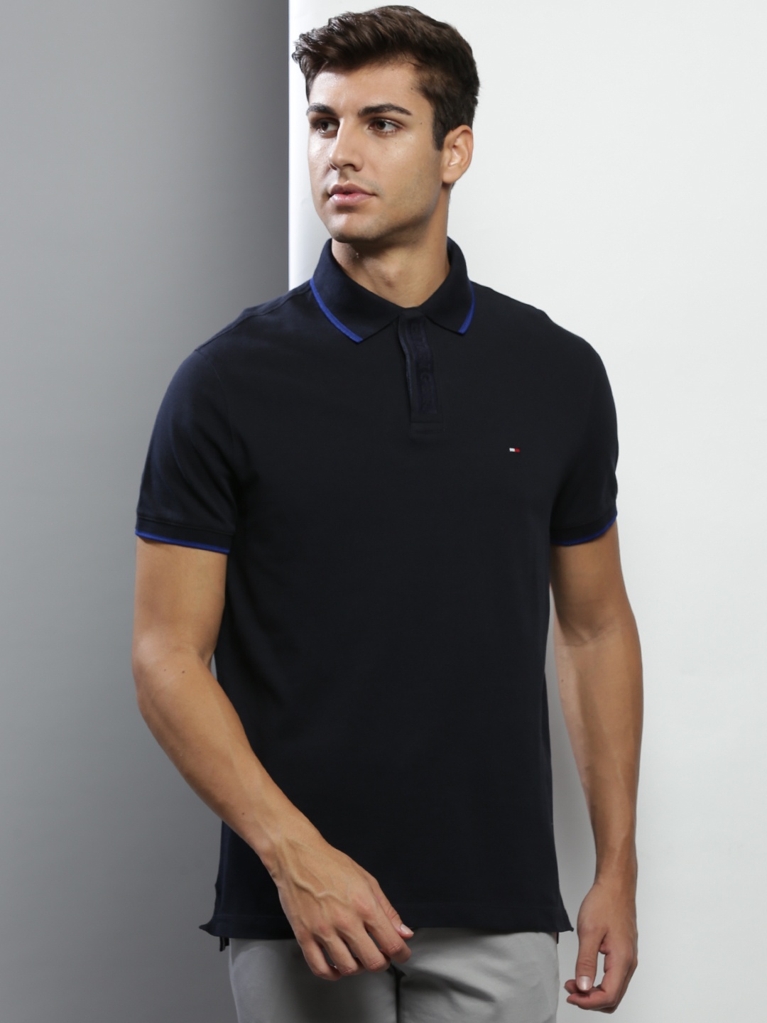 

Tommy Hilfiger Men Navy Blue Solid Cotton Polo Collar T-shirt