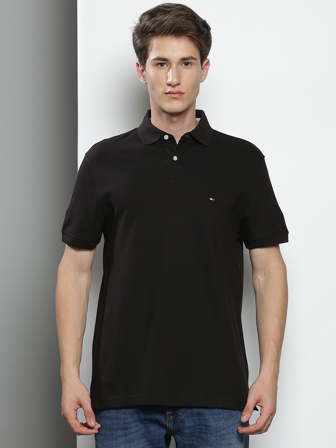 

Tommy Hilfiger Men Black Solid Polo Collar T-shirt