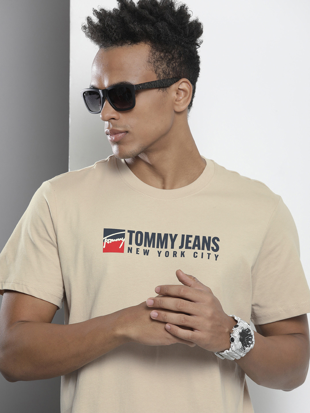 

Tommy Hilfiger Men Beige Typography Printed Applique Pure Cotton Casual T-shirt