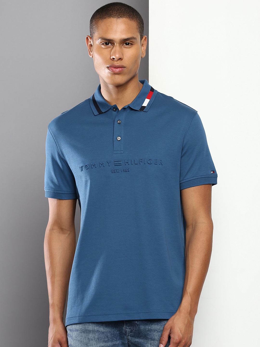 

Tommy Hilfiger Men Solid Polo Collar T-shirt With Embossed Detail, Blue
