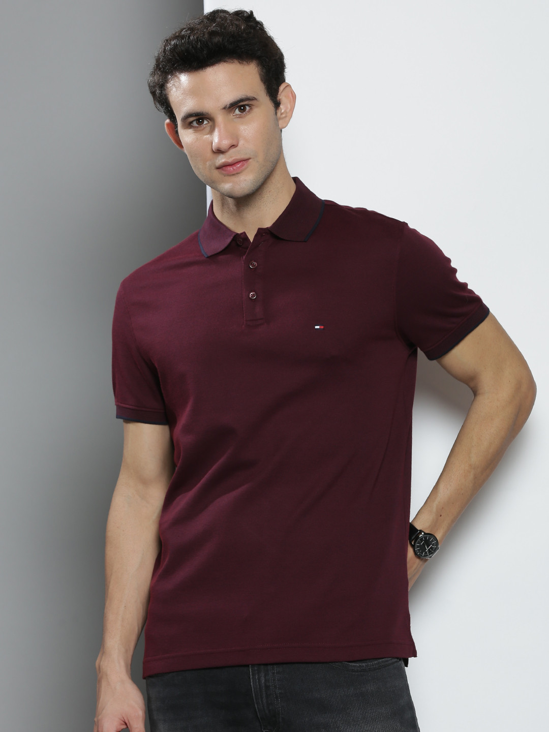 

Tommy Hilfiger Men Burgundy Solid Polo Collar Pure Cotton T-shirt