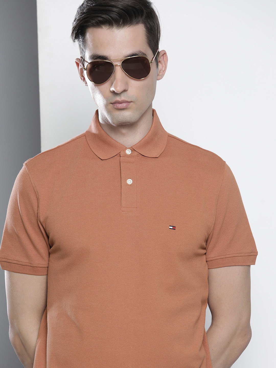 

Tommy Hilfiger Men Rust Brown Polo Collar T-shirt