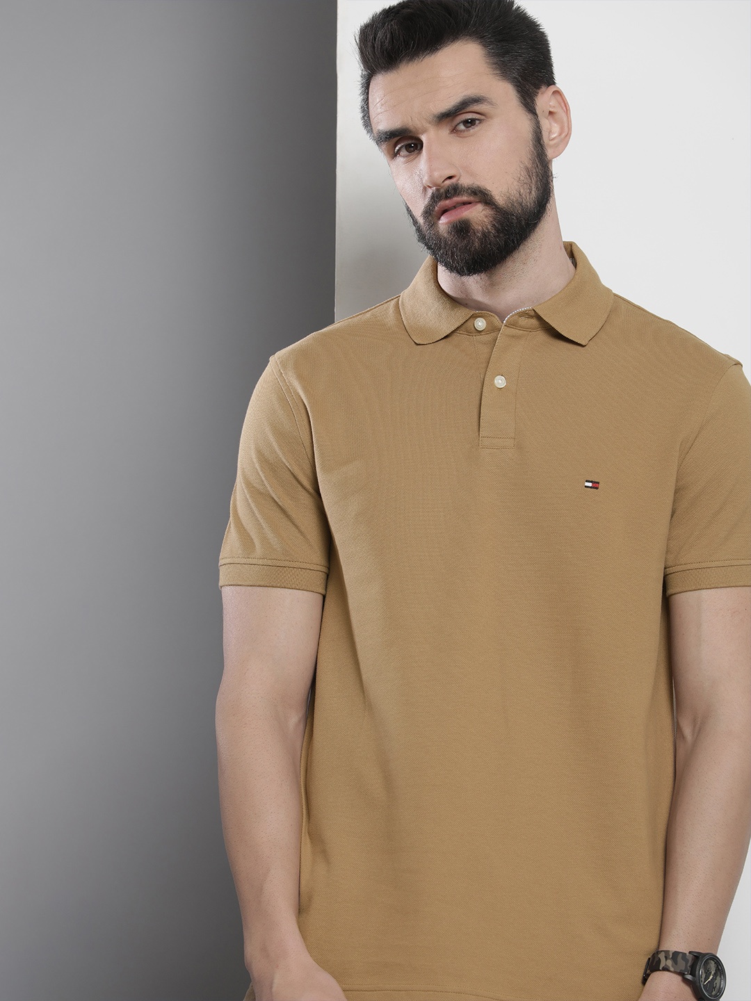 

Tommy Hilfiger Men Brown Self Designed Polo Collar Casual T-shirt