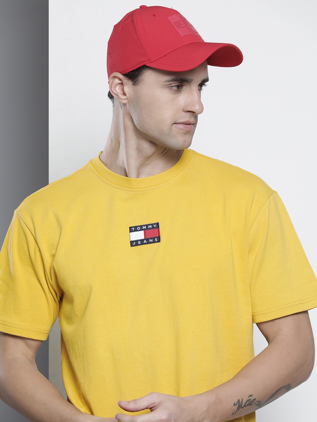 

Tommy Hilfiger Men Mustard Yellow Pure Cotton Applique T-shirt