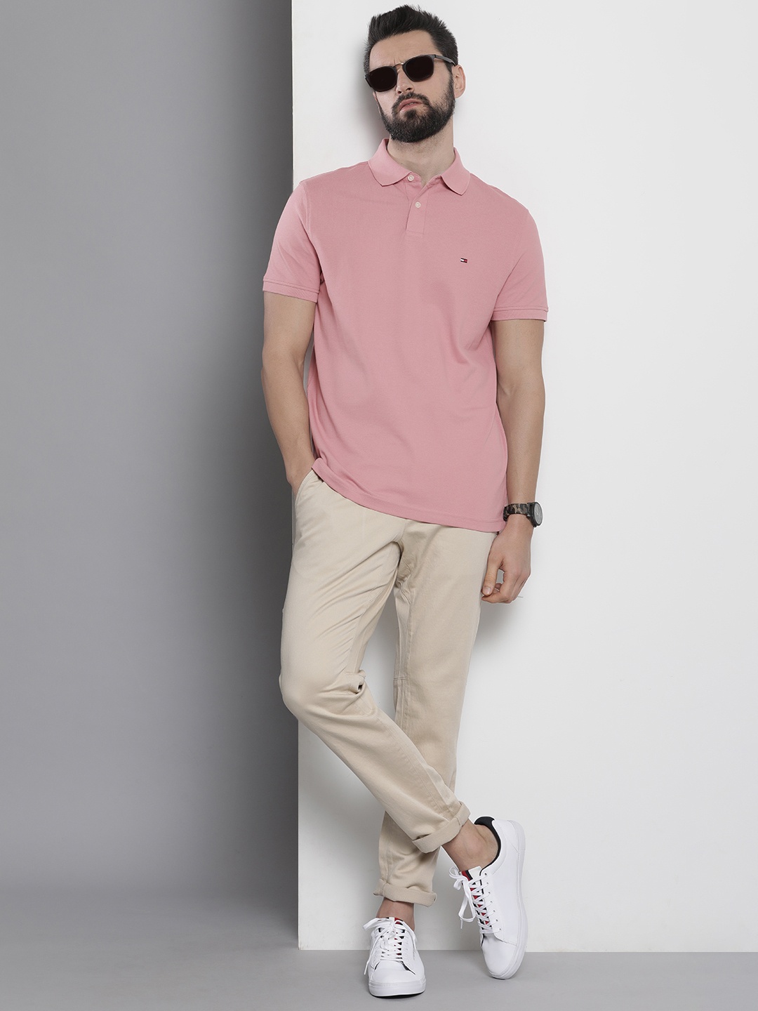 

Tommy Hilfiger Men Peach-Coloured Self Designed Polo Collar Casual T-shirt