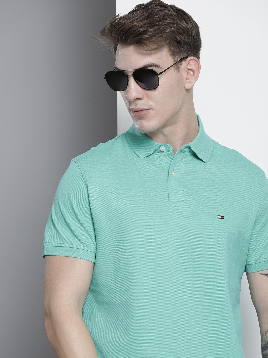 

Tommy Hilfiger Men Sage Green Solid Polo Collar Casual T-shirt