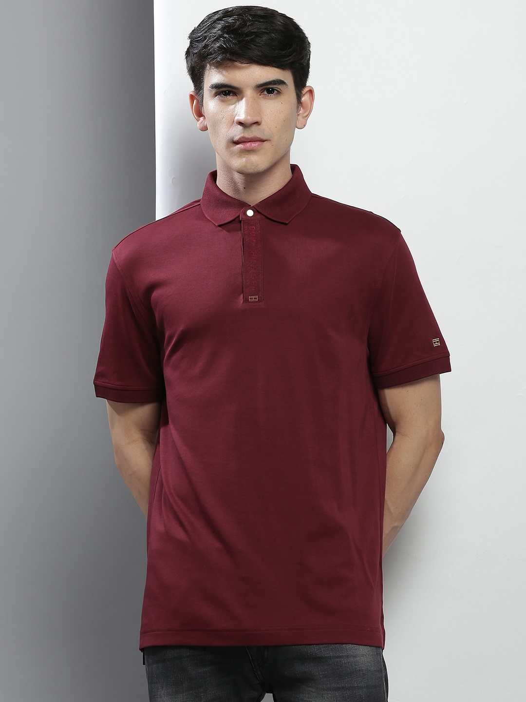 

Tommy Hilfiger Men Maroon Solid Cotton Polo Collar T-shirt