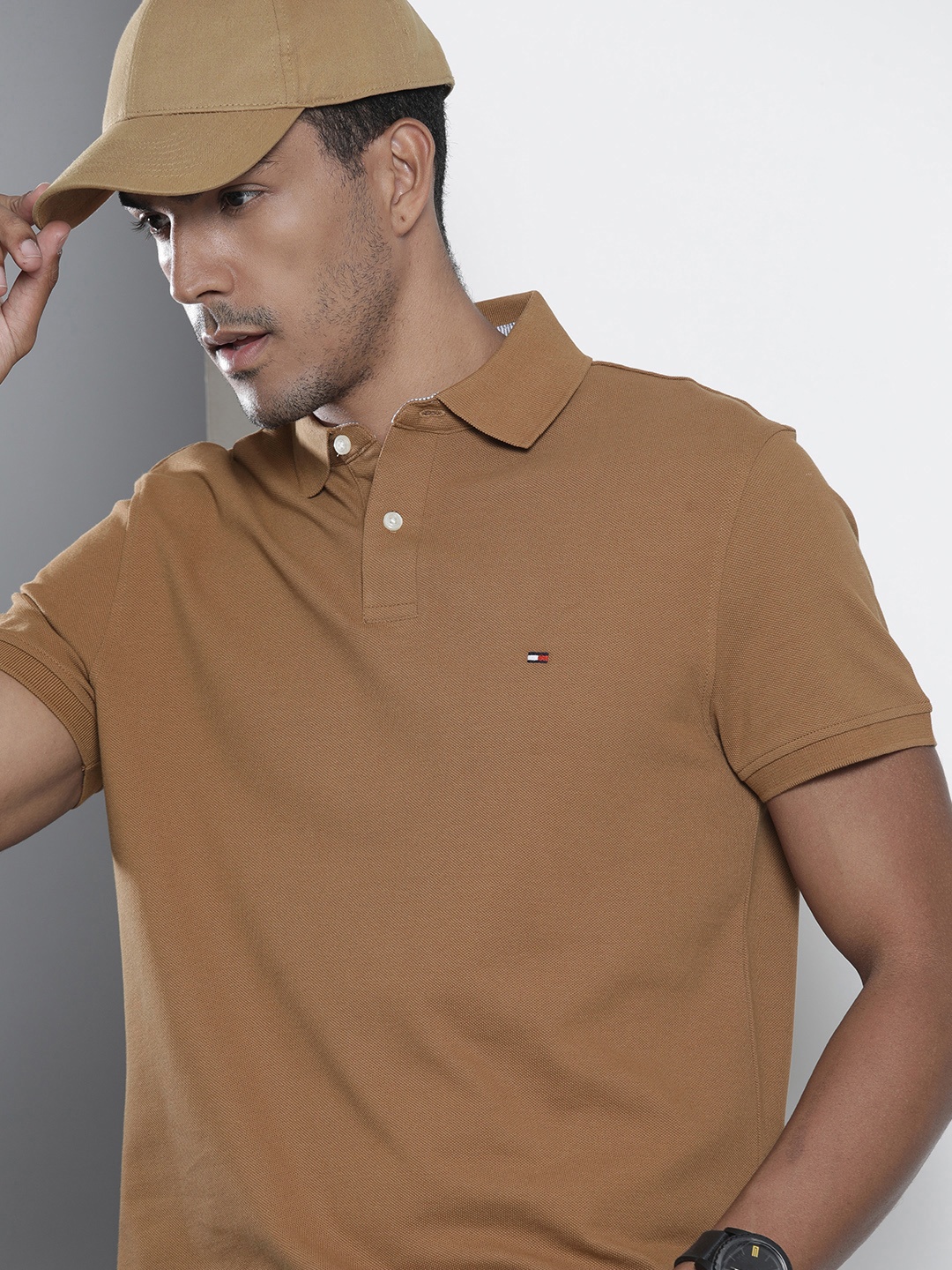 

Tommy Hilfiger Men Brown Solid Polo Collar T-shirt