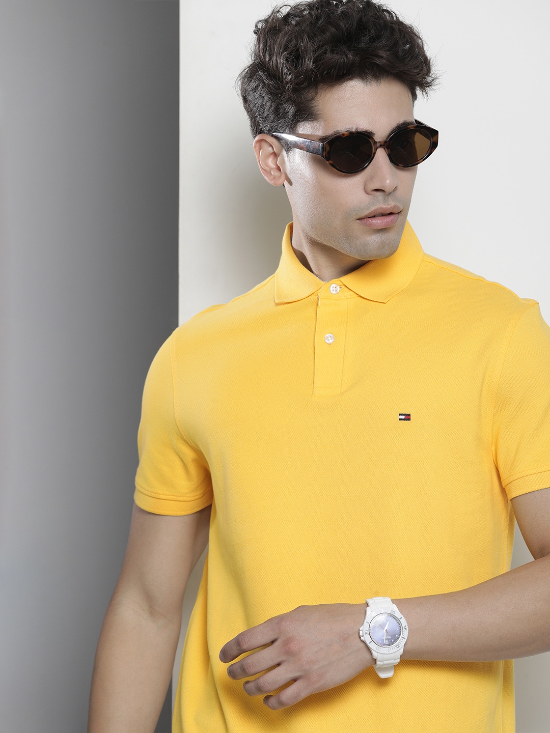 

Tommy Hilfiger Men Yellow Solid T-shirt With Flex Technology