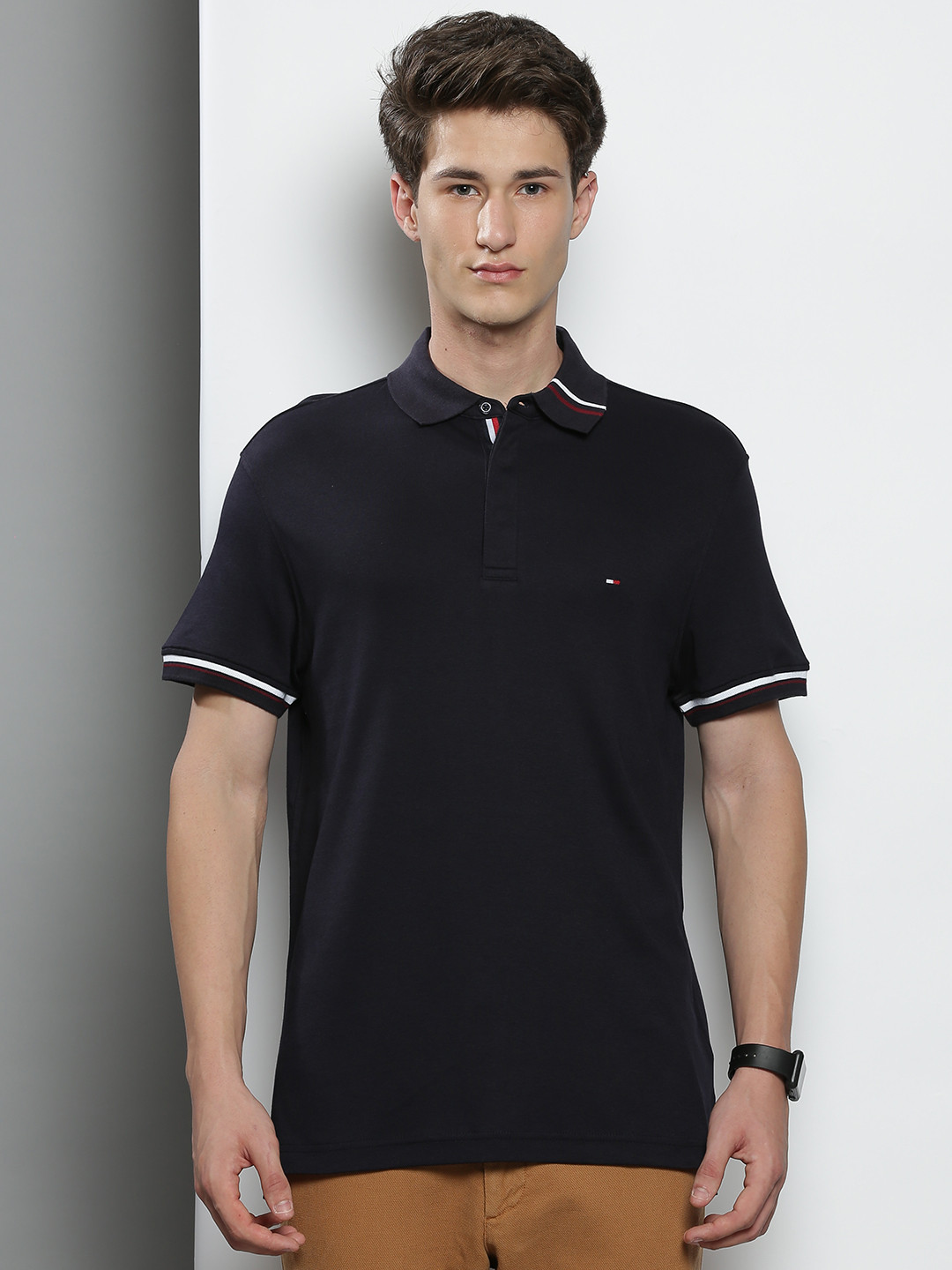 

Tommy Hilfiger Men Navy Blue Solid Polo CollarT-shirt
