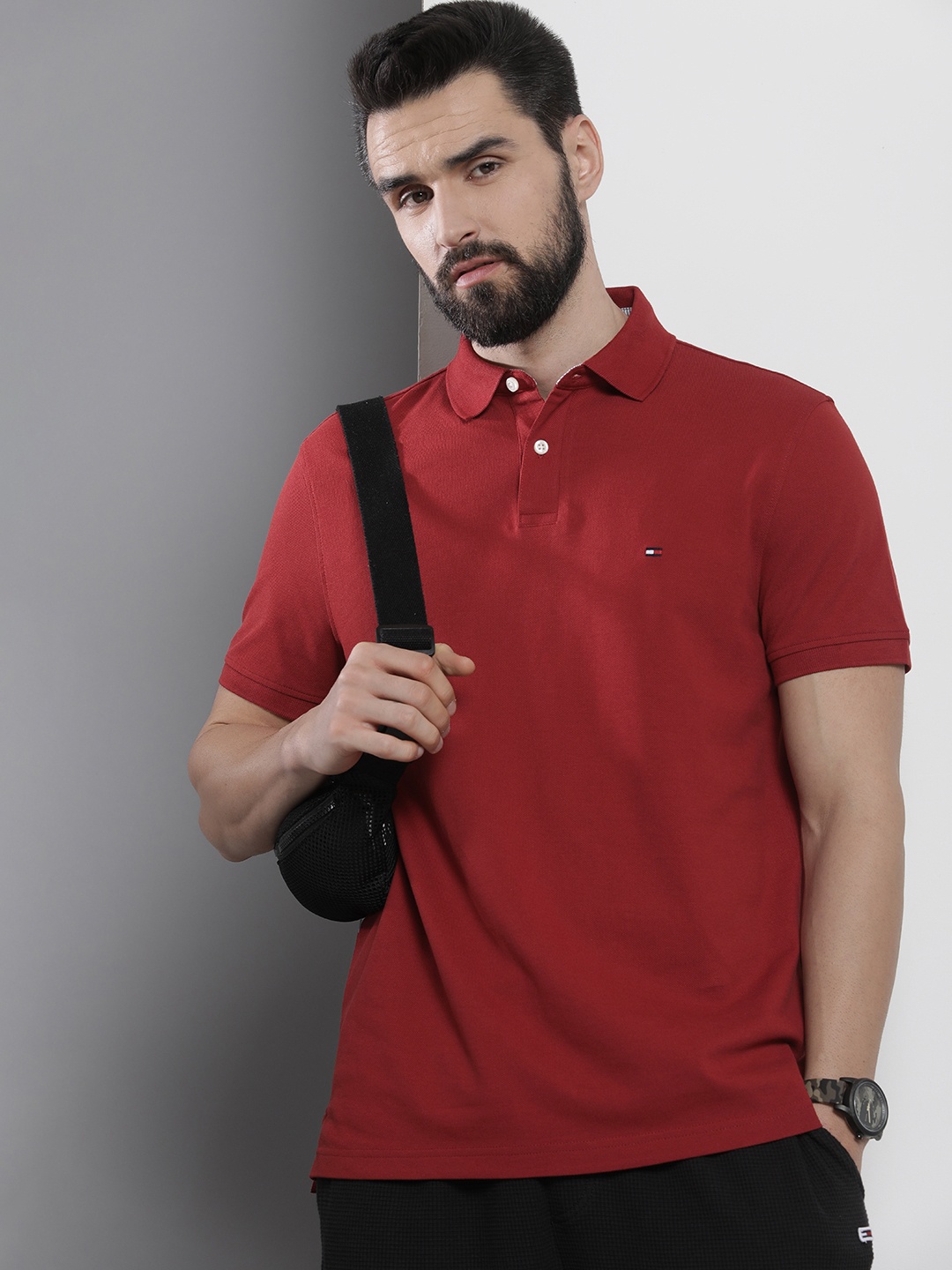 

Tommy Hilfiger Men Maroon Self Designed Polo Collar Casual T-shirt