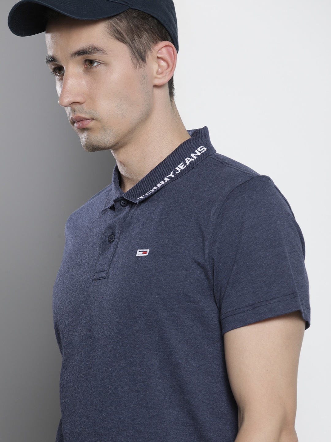 

Tommy Hilfiger Men Navy Blue Self Designed Polo Collar Casual T-shirt