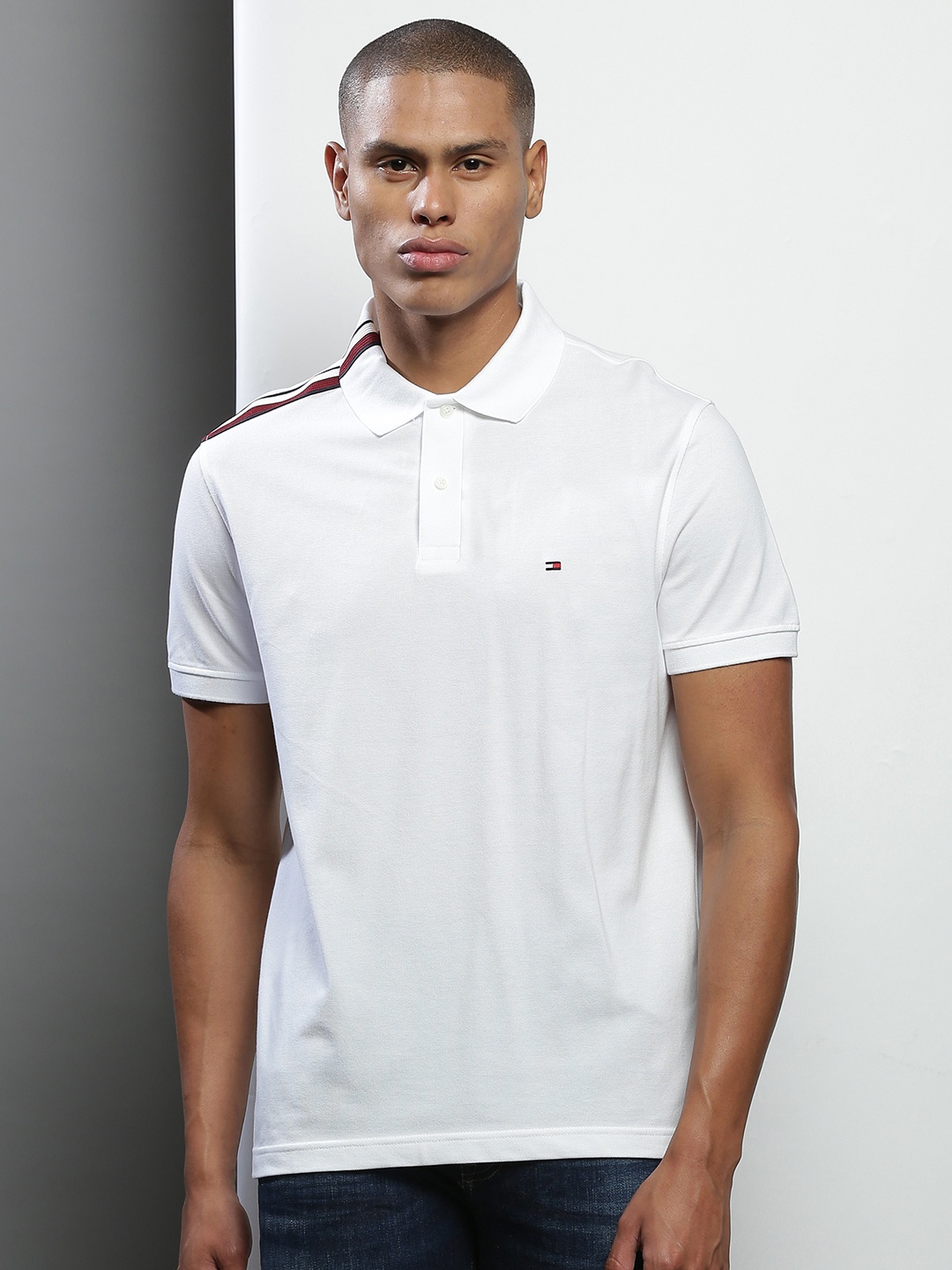 

Tommy Hilfiger Men White Solid Cotton Polo Collar T-shirt