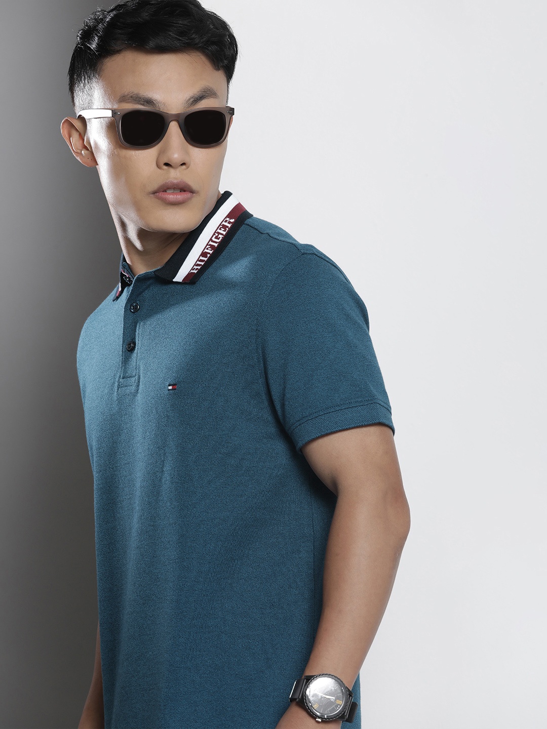 

Tommy Hilfiger Men Blue Self Designed Polo Collar Pure Cotton Casual T-shirt